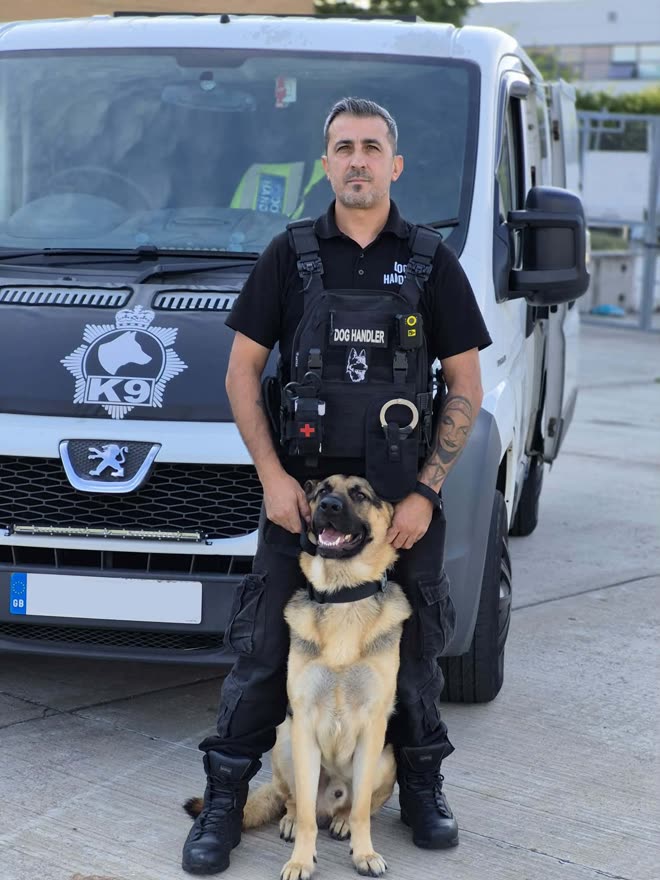 K9 handler with security dog